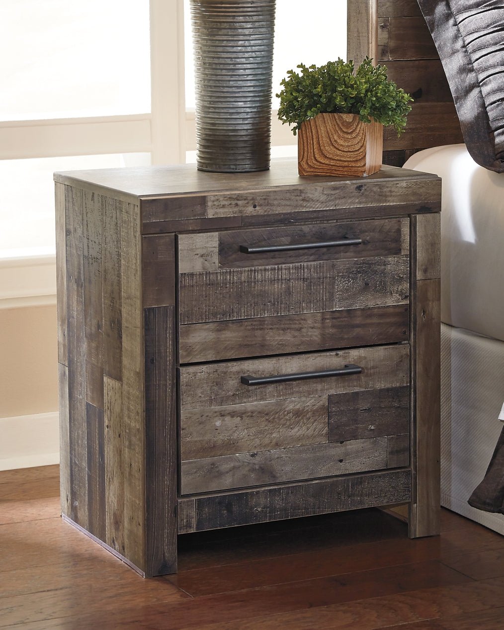 Derekson King Panel Bed with Mirrored Dresser, Chest and Nightstand - Image 10