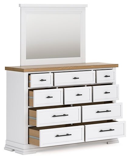 Ashbryn King Panel Storage Bed with Mirrored Dresser - Image 4
